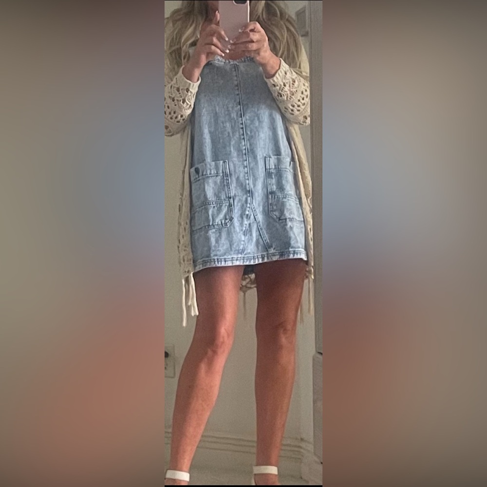 Free people denim overall dress size medium worn once only to try on.